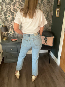 Light Denim Straight Leg Jeans With Decorative Buttons